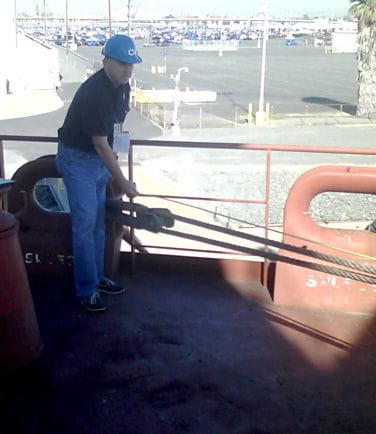 Partner Kurt Micklow inspecting tanker